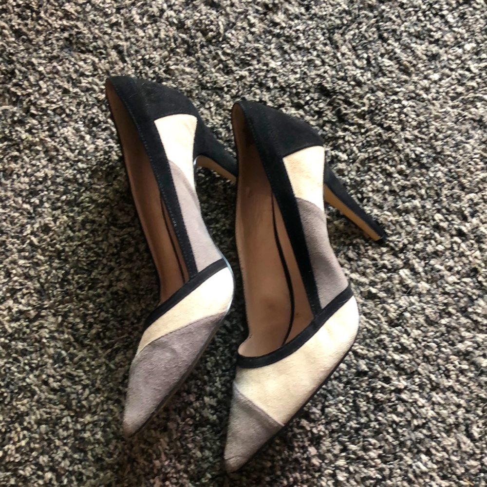 Tan,gray, and black heels. In good condition. No tears or rips.